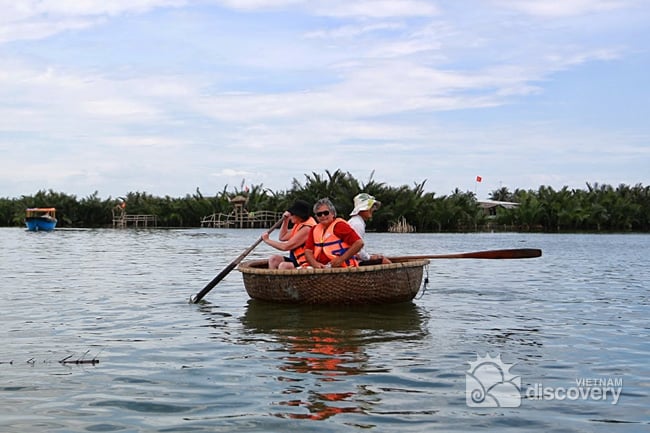 Rowing basket boat on the river Hoi An full day tour to countryside