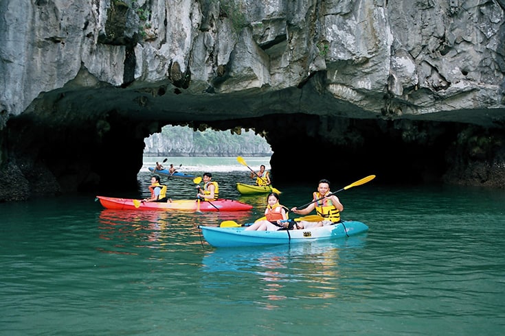 Dark and bright cave in Halong Bay