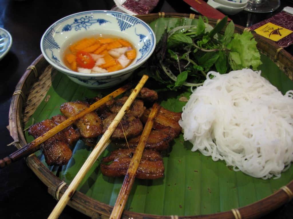 Noodle with grilled bamboo-stuck meat in Dong Xuan