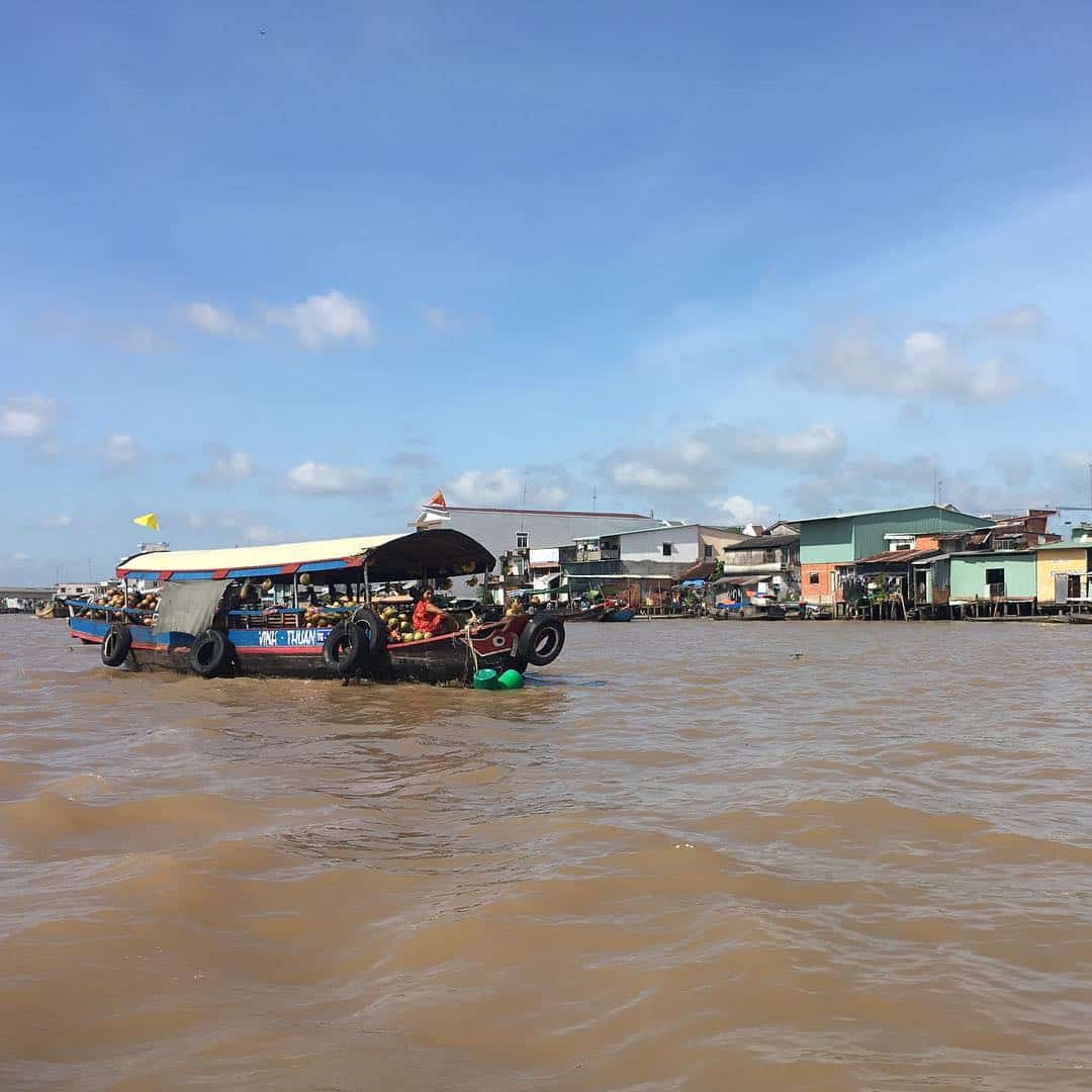 Boat around to visit Cai Be floating market - what to do on Tan Phong island