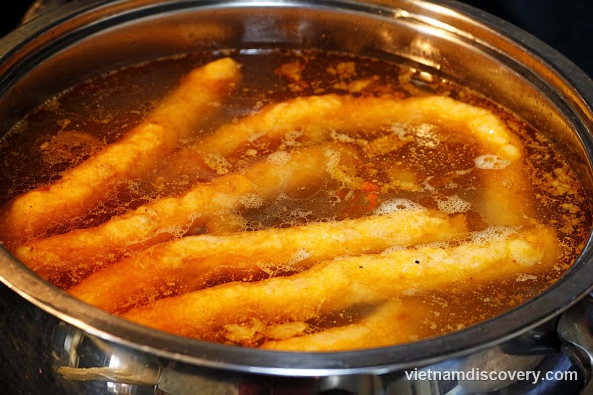 Shrimp balls floating in the broth