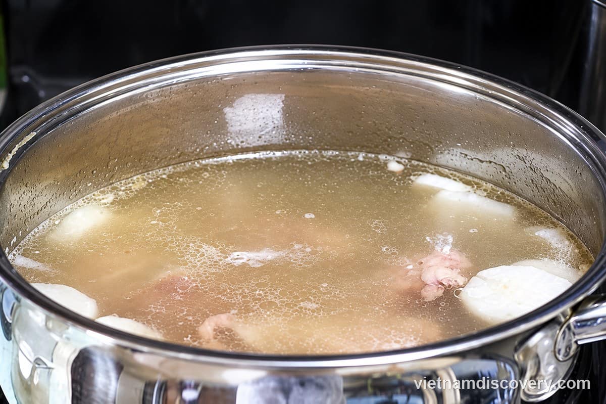 Pork bones, daikon and dried shrimp in the stockpot